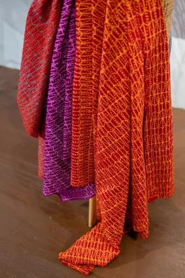 Pod batik fabric – orange on red