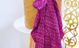 Pod batik fabric – pink on maroon
