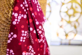 Pulang batik fabric – red & pink dots on maroon