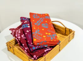 Pulang batik fabric – blue & yellow dots on red